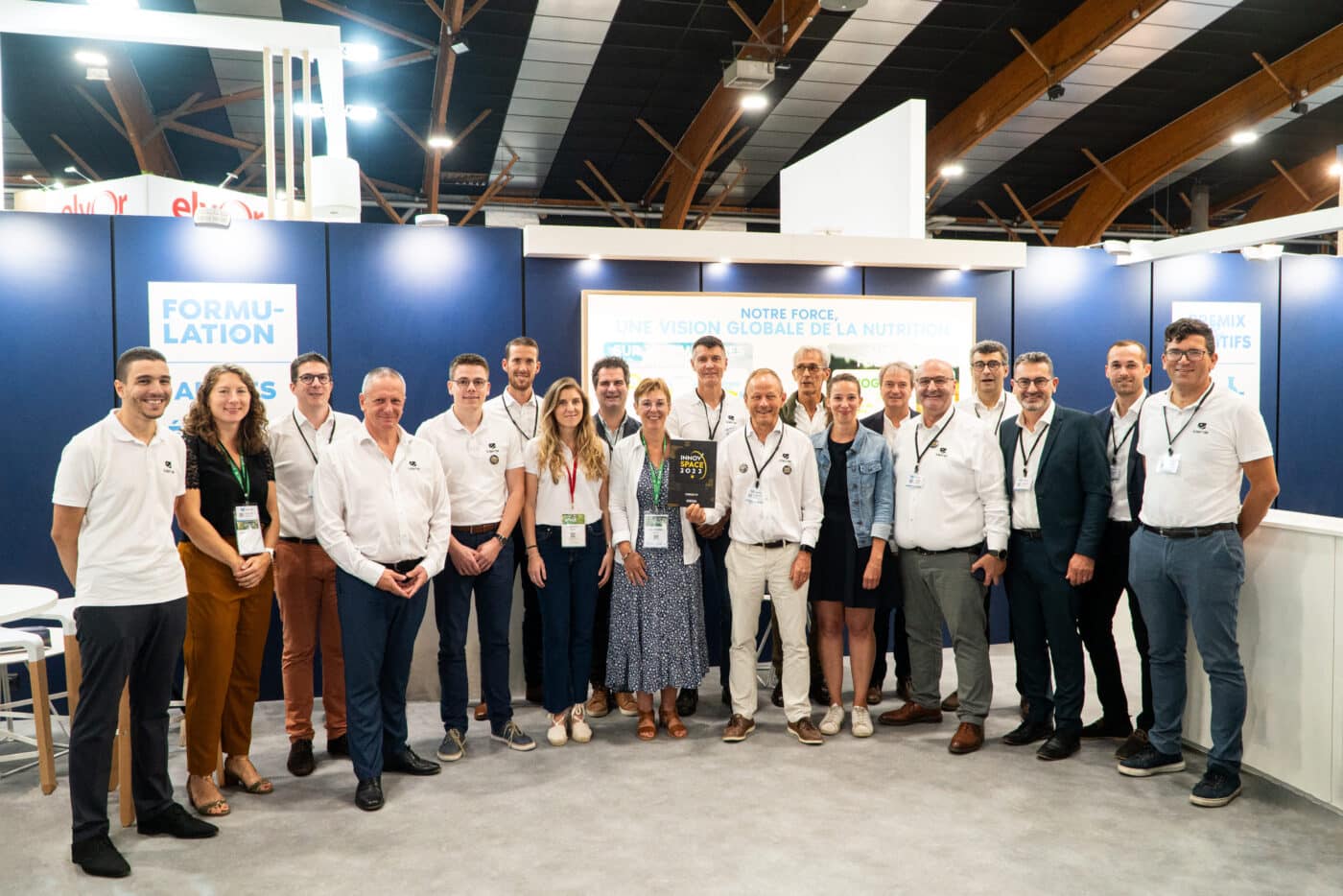 SPACE 2023, the entire IDENA team posing in front of the stand